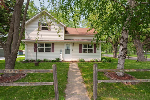 400 Mill St, Loyal, WI 54446 - traditional-style home with a front lawn