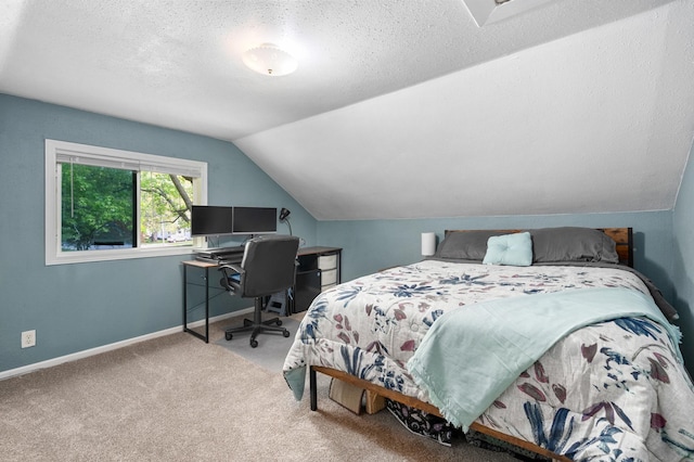 400 Mill St, Loyal, WI 54446 - carpeted bedroom featuring lofted ceiling, an office area, and a textured ceiling