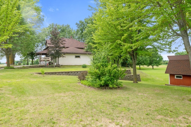9691 Kadler Ave NE, Otsego, MN 55362 - view of grassy yard featuring a storage unit