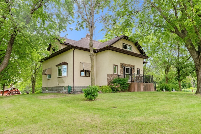 9691 Kadler Ave NE, Otsego, MN 55362 - view of property exterior with stucco siding and a yard