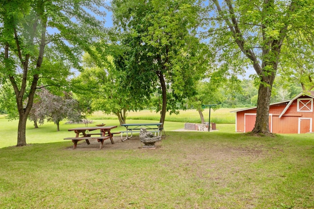 9691 Kadler Ave NE, Otsego, MN 55362 - view of green lawn with a barn and an outbuilding