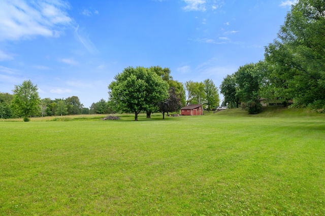 9691 Kadler Ave NE, Otsego, MN 55362 - view of grassy yard featuring an outdoor structure