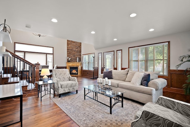 4407 Curve Ave, Edina, MN 55424 - living area featuring plenty of natural light, wood finished floors, a fireplace, stairs, and recessed lighting