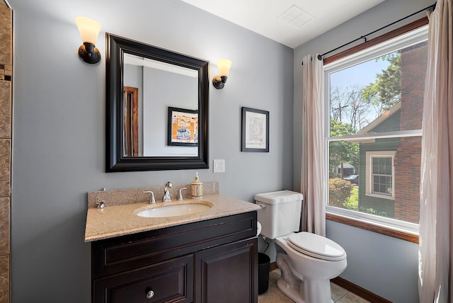 4407 Curve Ave, Edina, MN 55424 - bathroom featuring plenty of natural light, vanity, and tile patterned floors