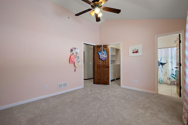 4407 Curve Ave, Edina, MN 55424 - unfurnished bedroom with carpet flooring, a walk in closet, high vaulted ceiling, ensuite bathroom, and a ceiling fan
