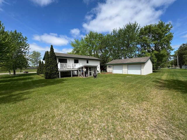 1420 4th St SW, Wadena, MN 56482 - rear view of property with a detached garage, an outbuilding, and a lawn