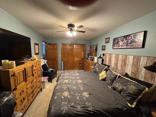 1420 4th St SW, Wadena, MN 56482 - bedroom featuring carpet, a closet, a ceiling fan, and a textured ceiling