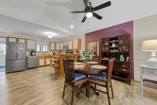 114 Oxford Path, Mankato, MN 56001 - dining room featuring vaulted ceiling, light wood finished floors, and ceiling fan