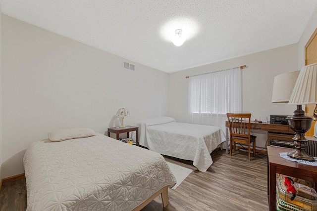 114 Oxford Path, Mankato, MN 56001 - bedroom featuring wood finished floors and baseboards