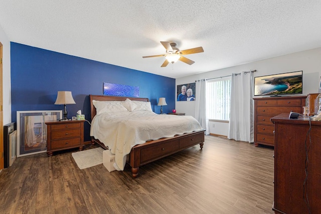 114 Oxford Path, Mankato, MN 56001 - bedroom with wood finished floors, a textured ceiling, and ceiling fan