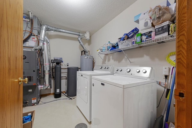 114 Oxford Path, Mankato, MN 56001 - washroom featuring washing machine and dryer, a textured ceiling, and water heater
