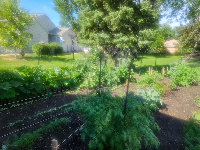311 Prairiewood Cir S Unit 307, Fargo, ND 58103 - view of yard featuring a vegetable garden