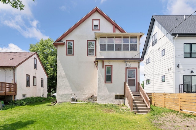 1108 16th Ave SE, Minneapolis, MN 55414 - rear view of property with stucco siding and entry steps