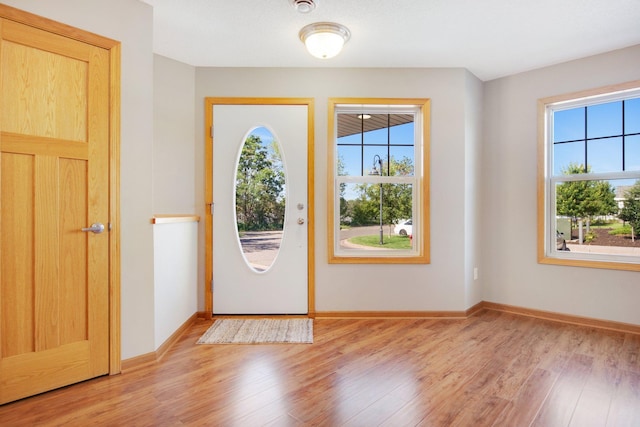 4715 Wyngate Blvd, Forest Lake, MN 55025 - foyer featuring light wood-type flooring and baseboards