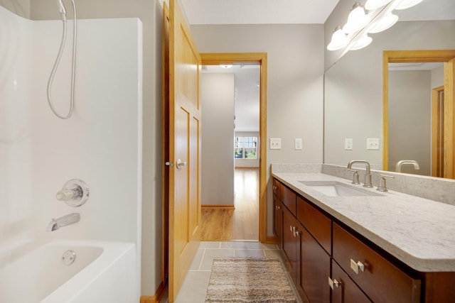 4715 Wyngate Blvd, Forest Lake, MN 55025 - bathroom featuring tile patterned flooring, vanity, and shower / bathtub combination