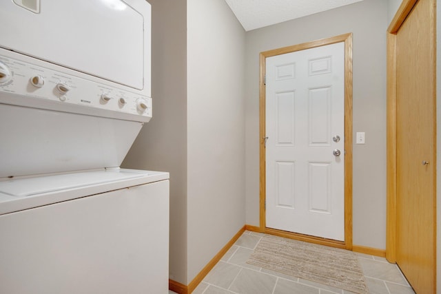 4715 Wyngate Blvd, Forest Lake, MN 55025 - washroom with stacked washer / drying machine and light tile patterned flooring