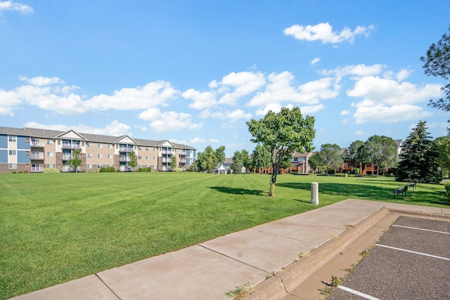 4715 Wyngate Blvd, Forest Lake, MN 55025 - view of home's community with a yard and uncovered parking