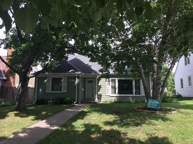 5505 Morgan Ave S, Minneapolis, MN 55419 - view of front of home featuring board and batten siding and a shingled roof