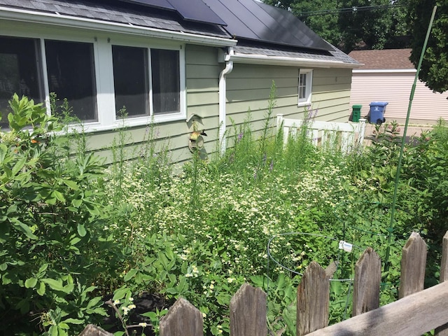5505 Morgan Ave S, Minneapolis, MN 55419 - view of property exterior with roof mounted solar panels