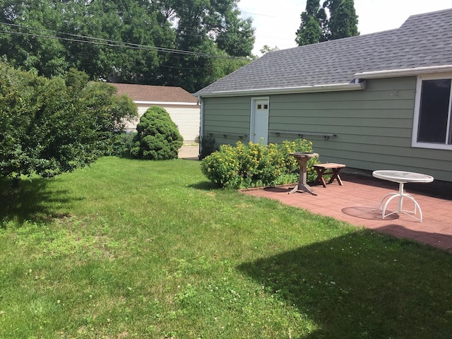 5505 Morgan Ave S, Minneapolis, MN 55419 - view of grassy yard featuring a patio