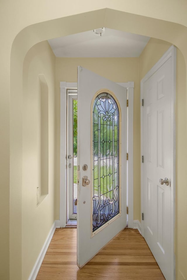 4700 Xerxes Ave N, Minneapolis, MN 55430 - entryway featuring light wood finished floors and arched walkways