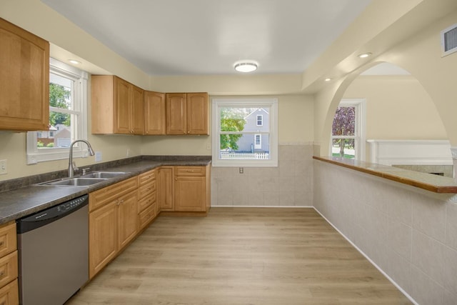 4700 Xerxes Ave N, Minneapolis, MN 55430 - kitchen featuring dishwasher, tile walls, dark countertops, healthy amount of natural light, and wainscoting