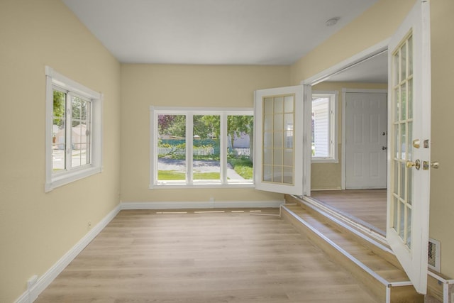 4700 Xerxes Ave N, Minneapolis, MN 55430 - unfurnished sunroom with plenty of natural light and french doors
