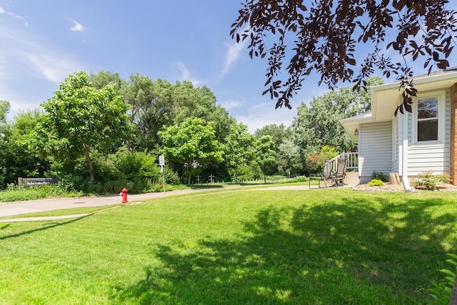 4700 Xerxes Ave N, Minneapolis, MN 55430 - view of grassy yard with view of wooded area
