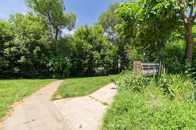 4700 Xerxes Ave N, Minneapolis, MN 55430 - view of green lawn featuring view of wooded area