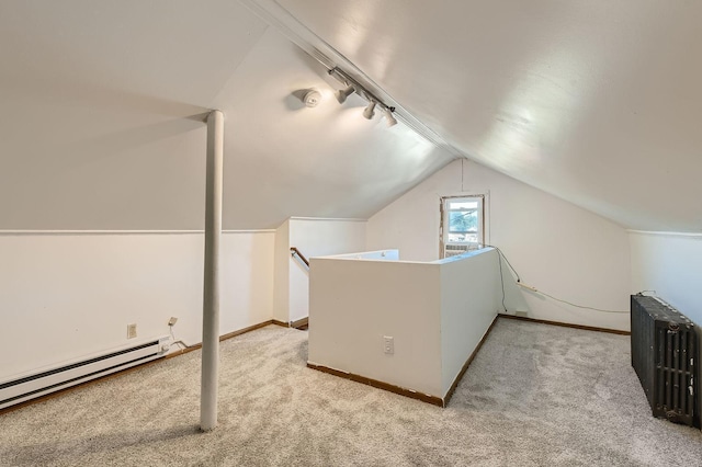 2810 Morgan Ave N, Minneapolis, MN 55411 - additional living space featuring baseboard heating, carpet flooring, radiator heating unit, and vaulted ceiling