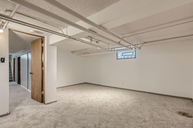 2810 Morgan Ave N, Minneapolis, MN 55411 - below grade area featuring carpet and a textured ceiling