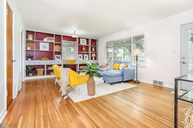 414 21st Ave N, Fargo, ND 58102 - living room featuring light wood-style floors and built in features