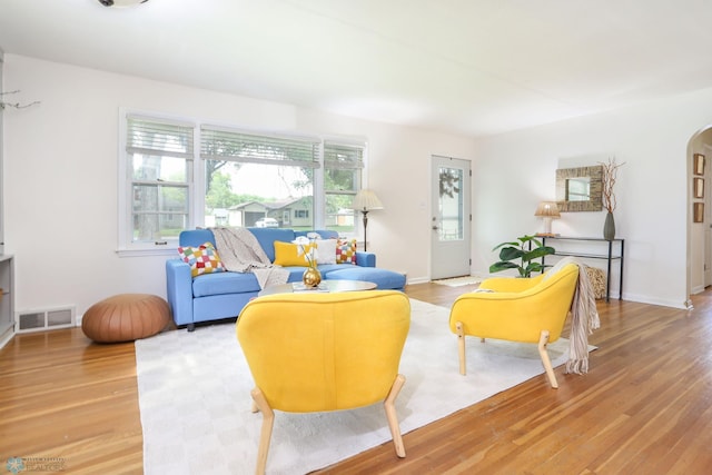 414 21st Ave N, Fargo, ND 58102 - living room with light wood-style flooring and arched walkways