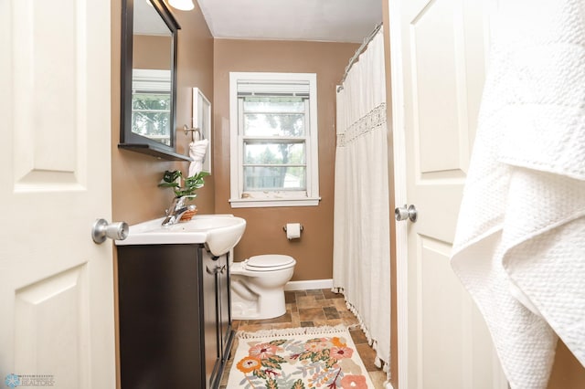414 21st Ave N, Fargo, ND 58102 - bathroom with vanity and stone finish flooring
