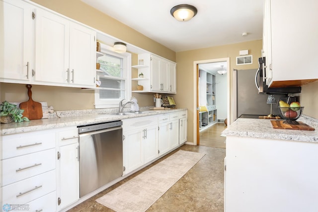 414 21st Ave N, Fargo, ND 58102 - kitchen with appliances with stainless steel finishes, open shelves, and white cabinets