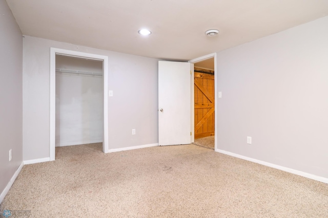 414 21st Ave N, Fargo, ND 58102 - unfurnished bedroom with carpet flooring, recessed lighting, and a closet