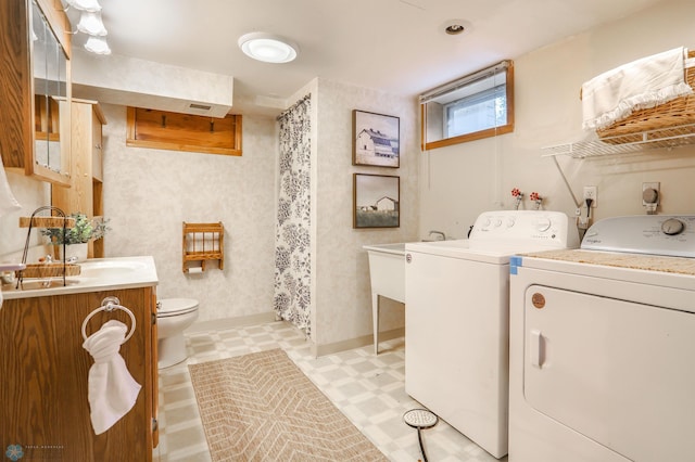 414 21st Ave N, Fargo, ND 58102 - laundry room with light floors and washing machine and dryer