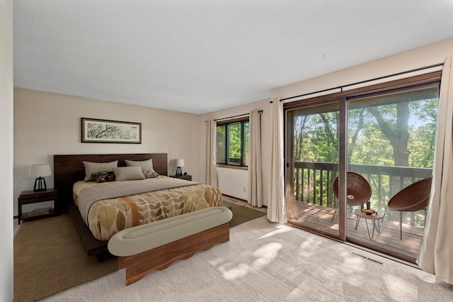 2671 Sumac Rdg, White Bear Lake, MN 55110 - carpeted bedroom featuring access to exterior