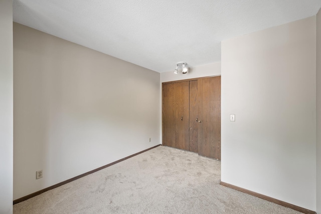 2671 Sumac Rdg, White Bear Lake, MN 55110 - unfurnished bedroom with carpet flooring and a closet