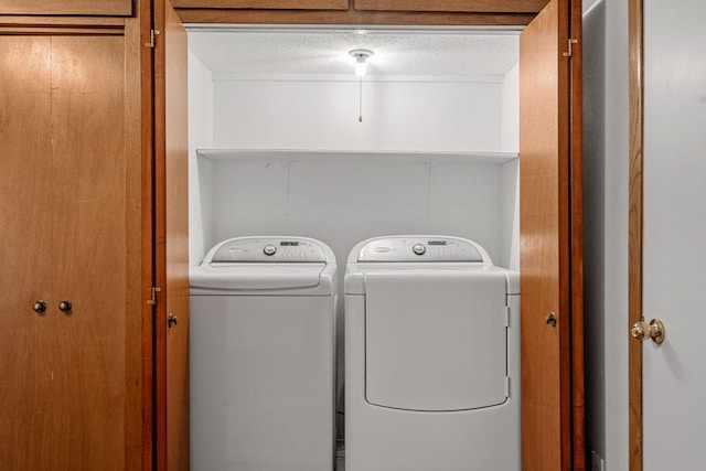 3820 8th St, Owatonna, MN 55060 - laundry room with independent washer and dryer and a textured ceiling