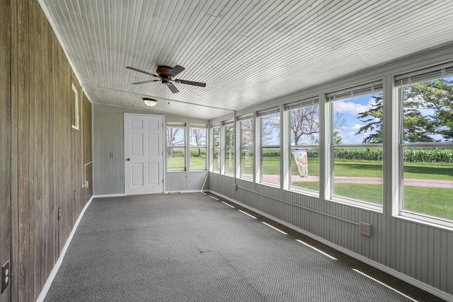 3820 8th St, Owatonna, MN 55060 - unfurnished sunroom featuring a ceiling fan