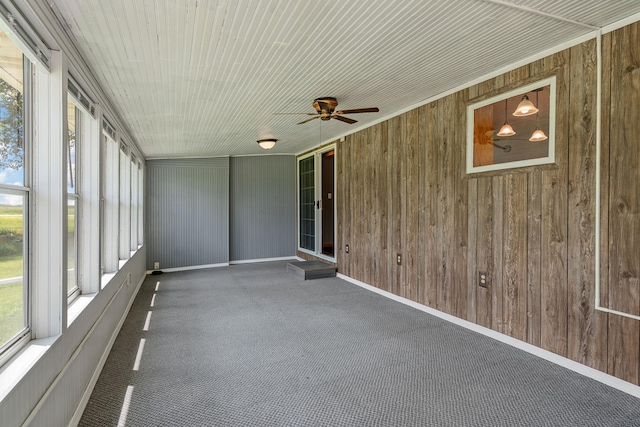 3820 8th St, Owatonna, MN 55060 - unfurnished sunroom featuring a ceiling fan