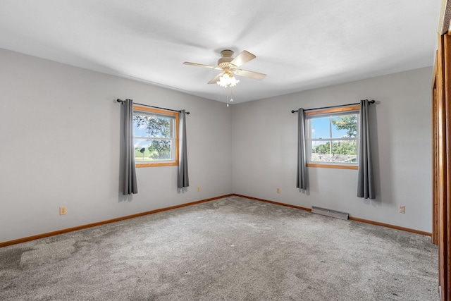 3820 8th St, Owatonna, MN 55060 - carpeted spare room with ceiling fan and baseboards