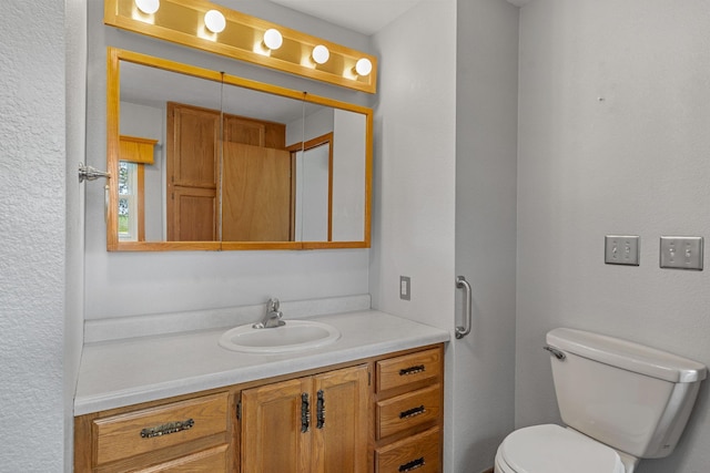 3820 8th St, Owatonna, MN 55060 - bathroom featuring vanity and toilet