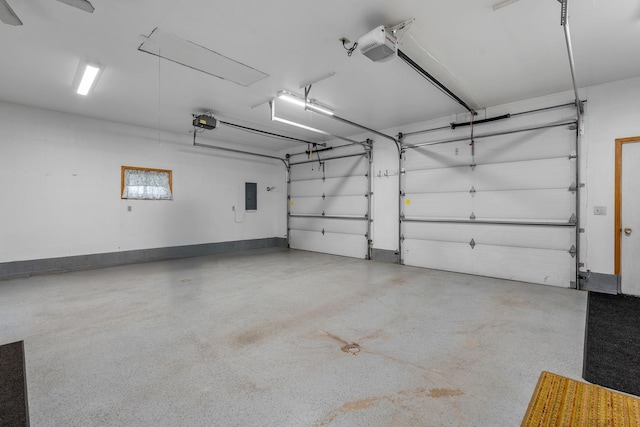 3820 8th St, Owatonna, MN 55060 - garage with a garage door opener and electric panel