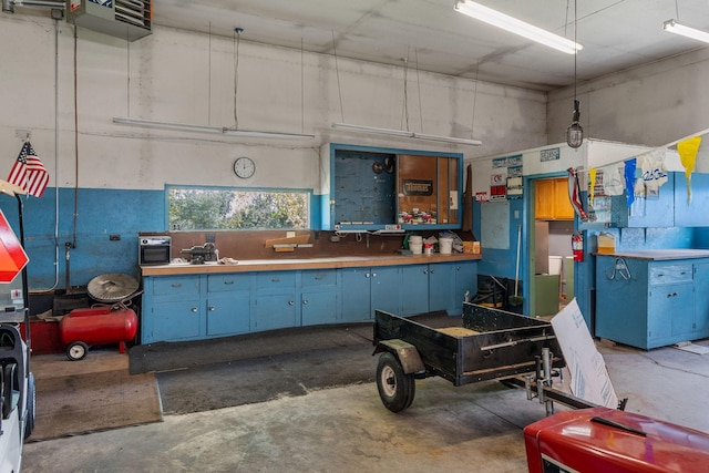 3820 8th St, Owatonna, MN 55060 - garage with a workshop area