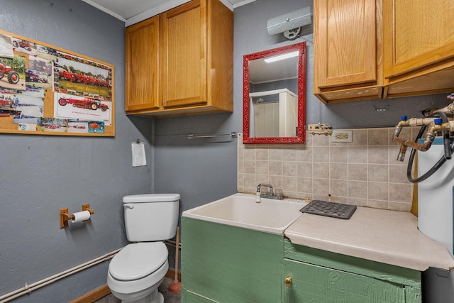 3820 8th St, Owatonna, MN 55060 - bathroom featuring tasteful backsplash and vanity