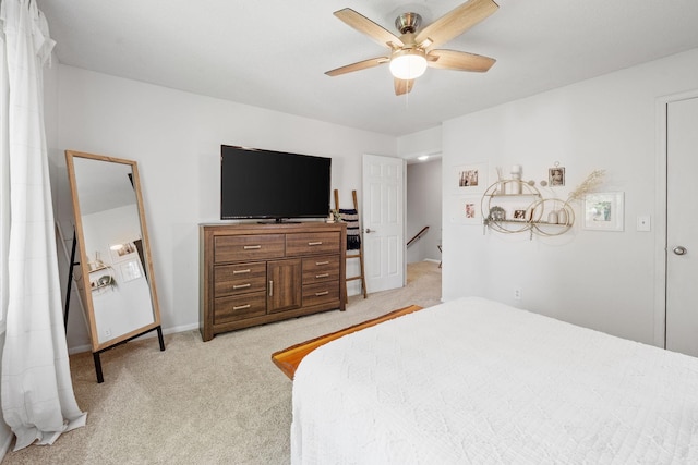 6502 Lancaster Ln N, Maple Grove, MN 55369 - bedroom with light colored carpet and ceiling fan