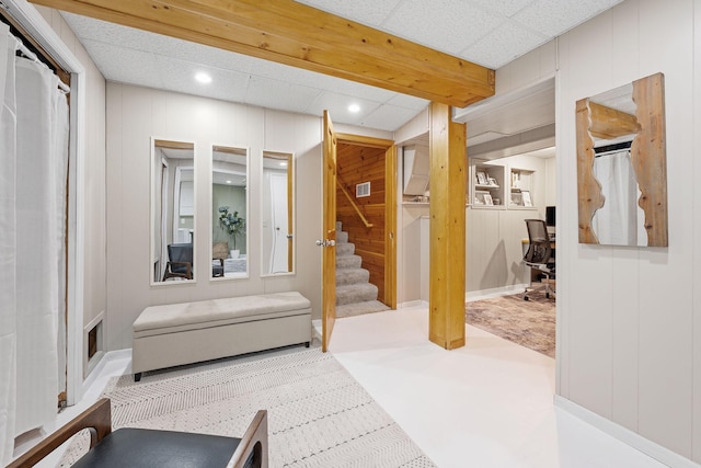 6502 Lancaster Ln N, Maple Grove, MN 55369 - entryway featuring recessed lighting, stairway, a decorative wall, and wooden walls