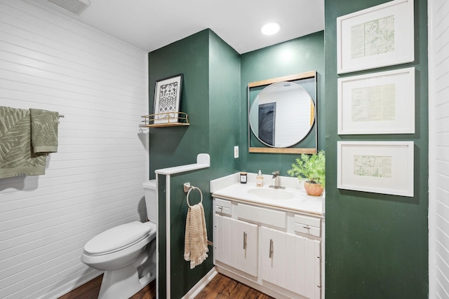 6502 Lancaster Ln N, Maple Grove, MN 55369 - half bath with wood finished floors and vanity